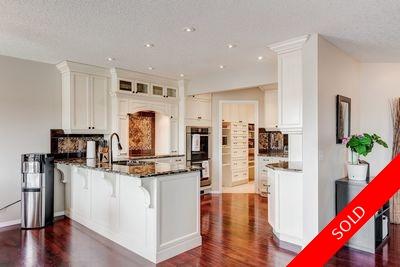 Stunning and Stylish 2 STOREY Executive Walkout in Valley Ridge with Sweeping Views to the VALLEY! 