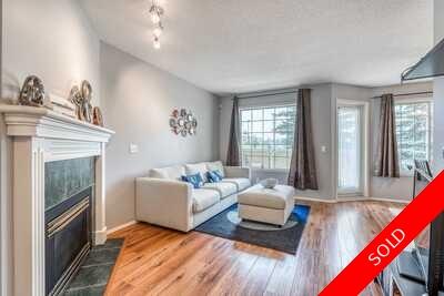 Stylish & Spacious 2 BR 2 Bath Townhome with Configured Walkout Basement with Low Condo Fees!